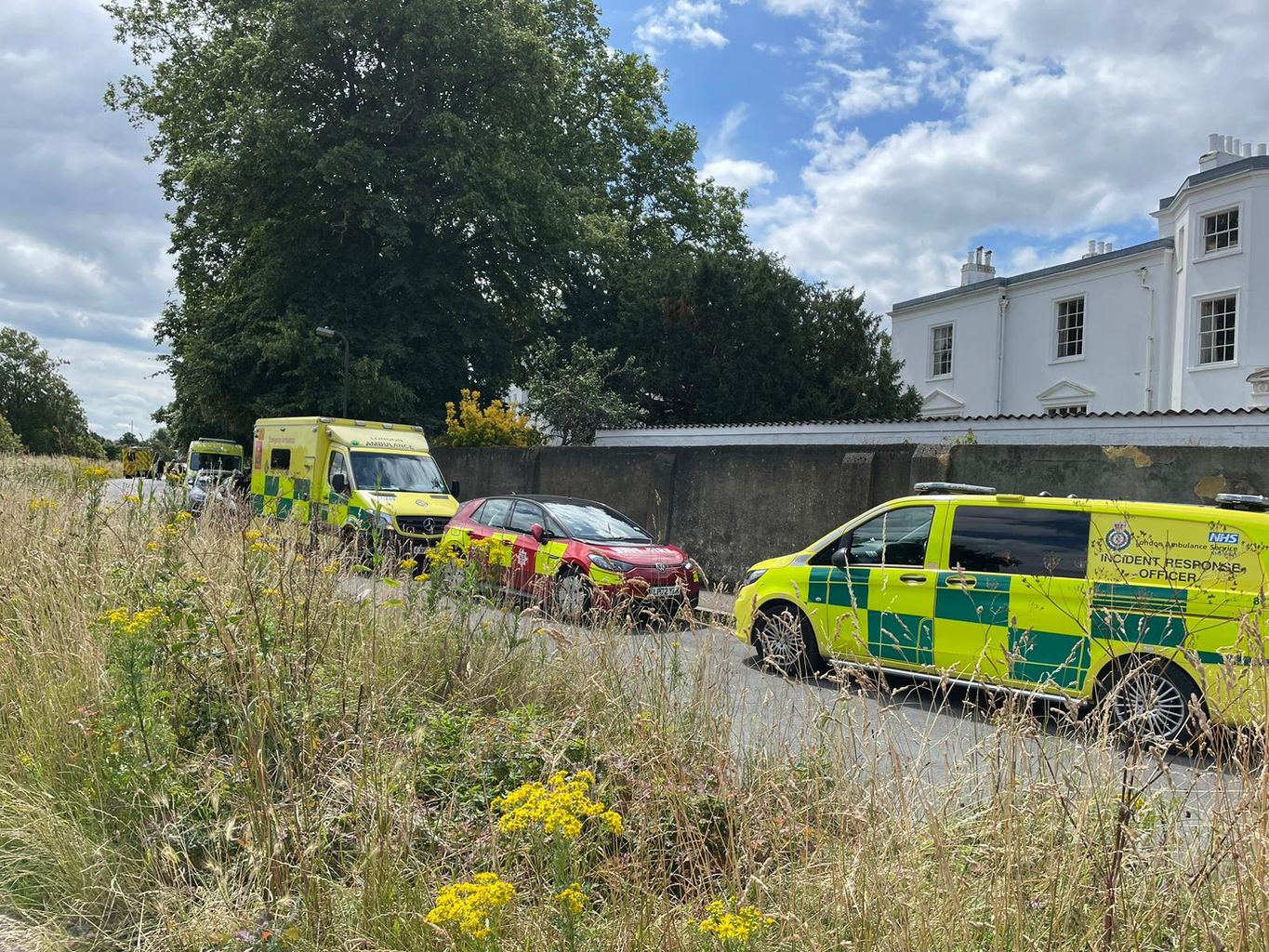Woman and girl in life threatening condition after school crash in